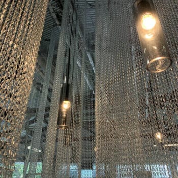 Slick black cylinder pendant display